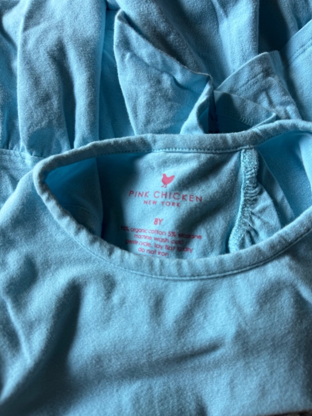 Pink Chicken peplum top with open back